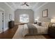 Serene bedroom with a coffered ceiling, large windows, and ample natural light at 10745 Shallowford Rd, Roswell, GA 30075