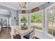 Cozy dining nook with bright windows offers scenic outdoor views and natural light at 3012 Keeneland Blvd, Mcdonough, GA 30252