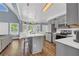 Spacious kitchen with stainless appliances, island, and eat-in dining for casual meals at 3012 Keeneland Blvd, Mcdonough, GA 30252