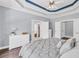 Elegant main bedroom with trey ceilings, hardwood floors, walk-in closet, and en suite bath offers style and function at 3012 Keeneland Blvd, Mcdonough, GA 30252