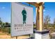 Sign for Bobby Jones Golf Course with an image of Bobby Jones, promoting a premium golfing experience at 785 Wilson Nw Rd, Atlanta, GA 30318
