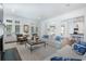 Cozy living room with large windows, a fireplace, and access to an outdoor area at 785 Wilson Nw Rd, Atlanta, GA 30318