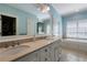 Bright main bathroom with double vanity, a soaking tub, and a separate shower at 785 Wilson Nw Rd, Atlanta, GA 30318