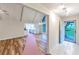 Inviting foyer with wood floors flowing into a bright, open-concept living area and kitchen at 2736 Whisper Trl, Douglasville, GA 30135