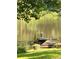 Scenic pond view featuring a dock, and wildlife at 2736 Whisper Trl, Douglasville, GA 30135