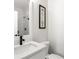 Contemporary bathroom with quartz countertop, black hardware, and a glass-enclosed shower at 3484 Orchard St, Atlanta, GA 30354