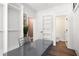 Spacious dressing room with custom shelves, workspace, and dual access doors at 3484 Orchard St, Atlanta, GA 30354