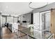 Bright open kitchen with white cabinets, an island, stainless appliances and access to the back yard at 3484 Orchard St, Atlanta, GA 30354