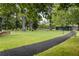 Scenic park with a walking path, benches, and lush green spaces for relaxation and recreation at 3484 Orchard St, Atlanta, GA 30354