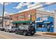 Street view showcasing a collection of restaurants with their unique facades, signage, and outdoor seating areas at 3484 Orchard St, Atlanta, GA 30354