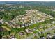 Expansive aerial view of a Roberts Crest neighborhood showcasing lush greenery and diverse housing styles at 3962 Roberts Crest Dr, Suwanee, GA 30024