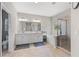 A gorgeous bathroom with a double sink vanity, a standalone shower, and a soaking tub at 3962 Roberts Crest Dr, Suwanee, GA 30024
