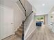 Foyer with wood floors and a stairway leading to the second level at 3962 Roberts Crest Dr, Suwanee, GA 30024