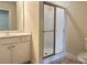Bathroom featuring single sink vanity and glass enclosed shower at 120 Chastain Nw Rd # 1803, Kennesaw, GA 30144
