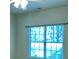 Bedroom with neutral paint, a ceiling fan, and a window with blinds at 120 Chastain Nw Rd # 1803, Kennesaw, GA 30144