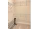 Walk-in closet with wire shelving ready for storage and organization at 120 Chastain Nw Rd # 1803, Kennesaw, GA 30144