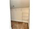 Walk-in closet with wire shelving for optimal storage at 120 Chastain Nw Rd # 1803, Kennesaw, GA 30144