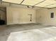 Spacious garage with doors and room for parking and storage at 120 Chastain Nw Rd # 1803, Kennesaw, GA 30144