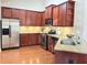Well-equipped kitchen featuring stainless steel appliances, granite countertops, and wooden cabinets at 120 Chastain Nw Rd # 1803, Kennesaw, GA 30144