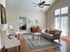 Elegant living room with hardwood floors and an abundance of natural light at 120 Chastain Nw Rd # 1803, Kennesaw, GA 30144