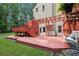 Large deck features a pergola and swing, perfect for enjoying the outdoors at 1438 Salem Dr, Alpharetta, GA 30009