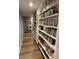 Ample storage space in the basement with organized shelving units at 1438 Salem Dr, Alpharetta, GA 30009