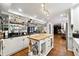 Spacious kitchen with an island, modern appliances, sleek countertops and custom cabinetry at 1438 Salem Dr, Alpharetta, GA 30009