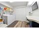 Well-organized laundry room with a modern washer and dryer at 1438 Salem Dr, Alpharetta, GA 30009
