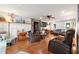 Large open living room featuring a stone fireplace, hardwood floors, and plush seating for a relaxing atmosphere at 1438 Salem Dr, Alpharetta, GA 30009
