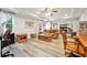 Cozy living room features neutral tones, hard wood floors, recessed lights and access to the backyard at 1438 Salem Dr, Alpharetta, GA 30009