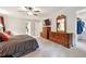 Spacious main bedroom with generous closet space, carpeted floors, and lots of natural light at 1438 Salem Dr, Alpharetta, GA 30009