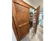 Walk-in pantry with shelving, storage space, and decorative sliding door at 1438 Salem Dr, Alpharetta, GA 30009
