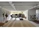 Finished basement with exercise equipment and exposed beams at 1656 N Pelham Ne Rd, Atlanta, GA 30324