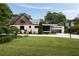 Stunning modern home with manicured lawn, and clean architectural lines at 1656 N Pelham Ne Rd, Atlanta, GA 30324