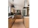 Well-equipped kitchen with modern appliances, sleek countertops, and hardwood flooring at 1656 N Pelham Ne Rd, Atlanta, GA 30324