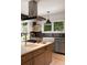 Stylish kitchen with sleek appliances, marble countertops, and ample natural light at 1656 N Pelham Ne Rd, Atlanta, GA 30324