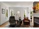 Bright living room featuring a fireplace, hardwood floors, and natural light at 1656 N Pelham Ne Rd, Atlanta, GA 30324