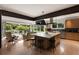 Open-concept living space featuring a modern kitchen and outdoor patio access for seamless entertaining at 1656 N Pelham Ne Rd, Atlanta, GA 30324