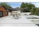 Spacious rooftop terrace with outdoor seating and a glass railing at 1656 N Pelham Ne Rd, Atlanta, GA 30324