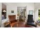 Bright sunroom with comfortable seating and garden views provides a relaxing transition between indoors and outdoors at 1656 N Pelham Ne Rd, Atlanta, GA 30324