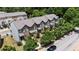 An aerial view of new townhomes with brick, gray, and neutral color exteriors at 1004 Bayrose Cir, East Point, GA 30344