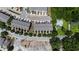 An aerial view of newly built townhomes in a suburban neighborhood at 1004 Bayrose Cir, East Point, GA 30344