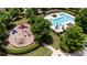 Aerial view of community pool and playground surrounded by mature trees in a well-maintained neighborhood at 1004 Bayrose Cir, East Point, GA 30344