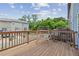 Inviting wooden deck with railing overlooking a landscaped backyard and neighborhood at 1004 Bayrose Cir, East Point, GA 30344