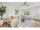 Inviting living room boasting hardwood floors, a large sectional sofa, and ample natural light at 1004 Bayrose Cir, East Point, GA 30344