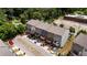 Aerial view of modern townhomes, each with a private balcony and individual parking spaces at 1004 Bayrose Cir, East Point, GA 30344
