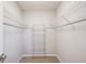 Walk-in closet with multiple wire shelving units providing ample storage space for an organized wardrobe at 563 Trillum Sw Ct # 563, Marietta, GA 30008