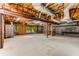 Unfinished basement presents an open, customizable space with exposed beams and block walls at 8316 Hewlett Rd, Sandy Springs, GA 30350