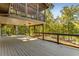 Spacious outdoor deck with wooded views, ideal for enjoying nature at 8316 Hewlett Rd, Sandy Springs, GA 30350