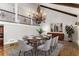 Elegant dining room with a chandelier, vaulted ceiling, and hardwood floors at 8316 Hewlett Rd, Sandy Springs, GA 30350